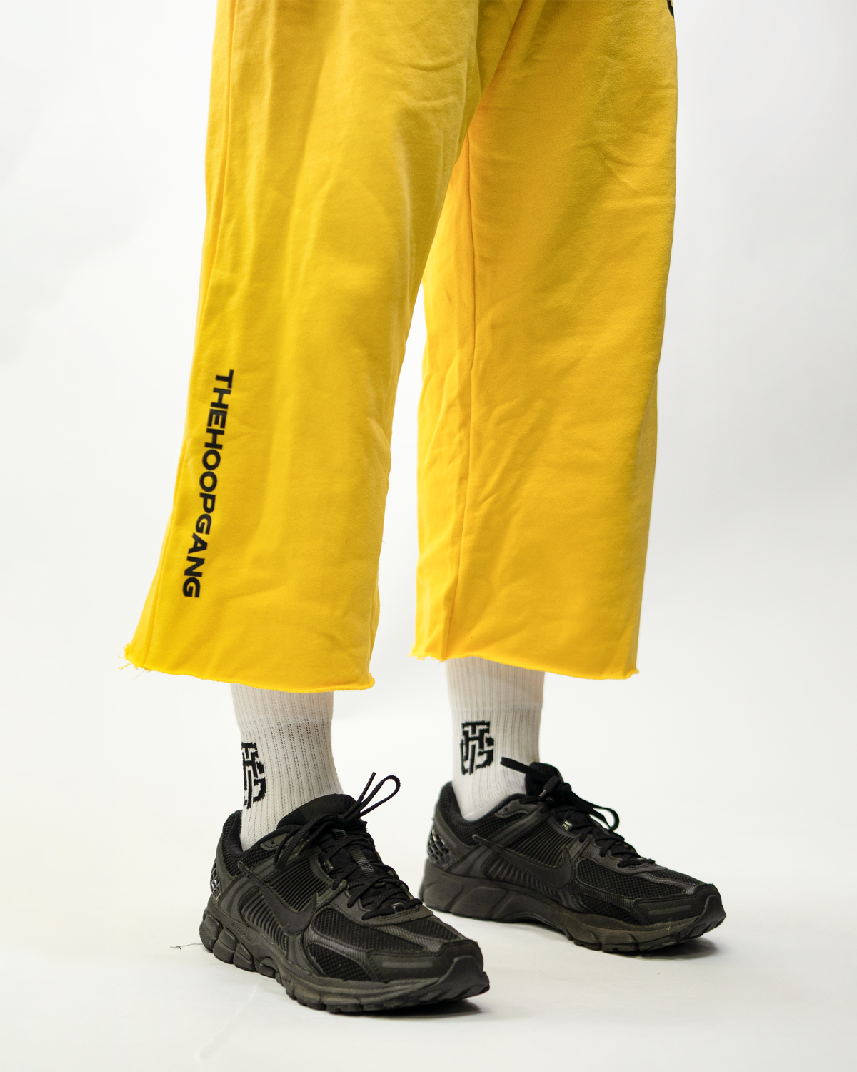 THG Yellow Cropped Sweatpants, close up of the cropped hem above the ankle