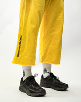 THG Yellow Cropped Sweatpants, close up of the cropped hem above the ankle