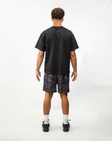Dark Camo Shorts on model, back view