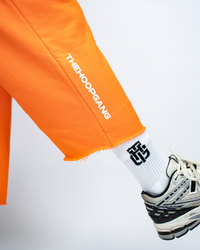 THG ORANGE CROPPED SWEATPANTS