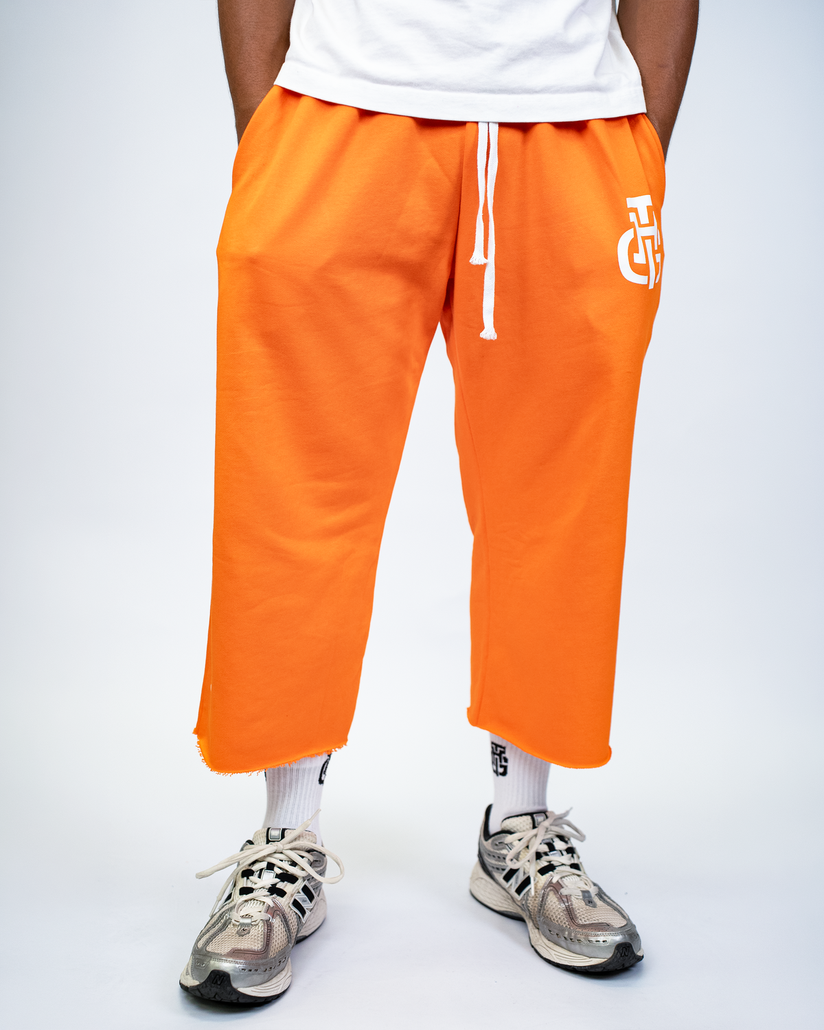THG ORANGE CROPPED SWEATPANTS
