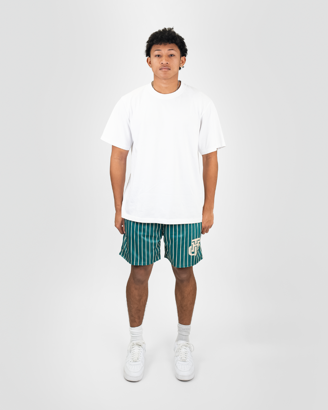 CREAM AND GREEN SHORTS