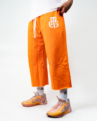 THG ORANGE CROPPED SWEATPANTS