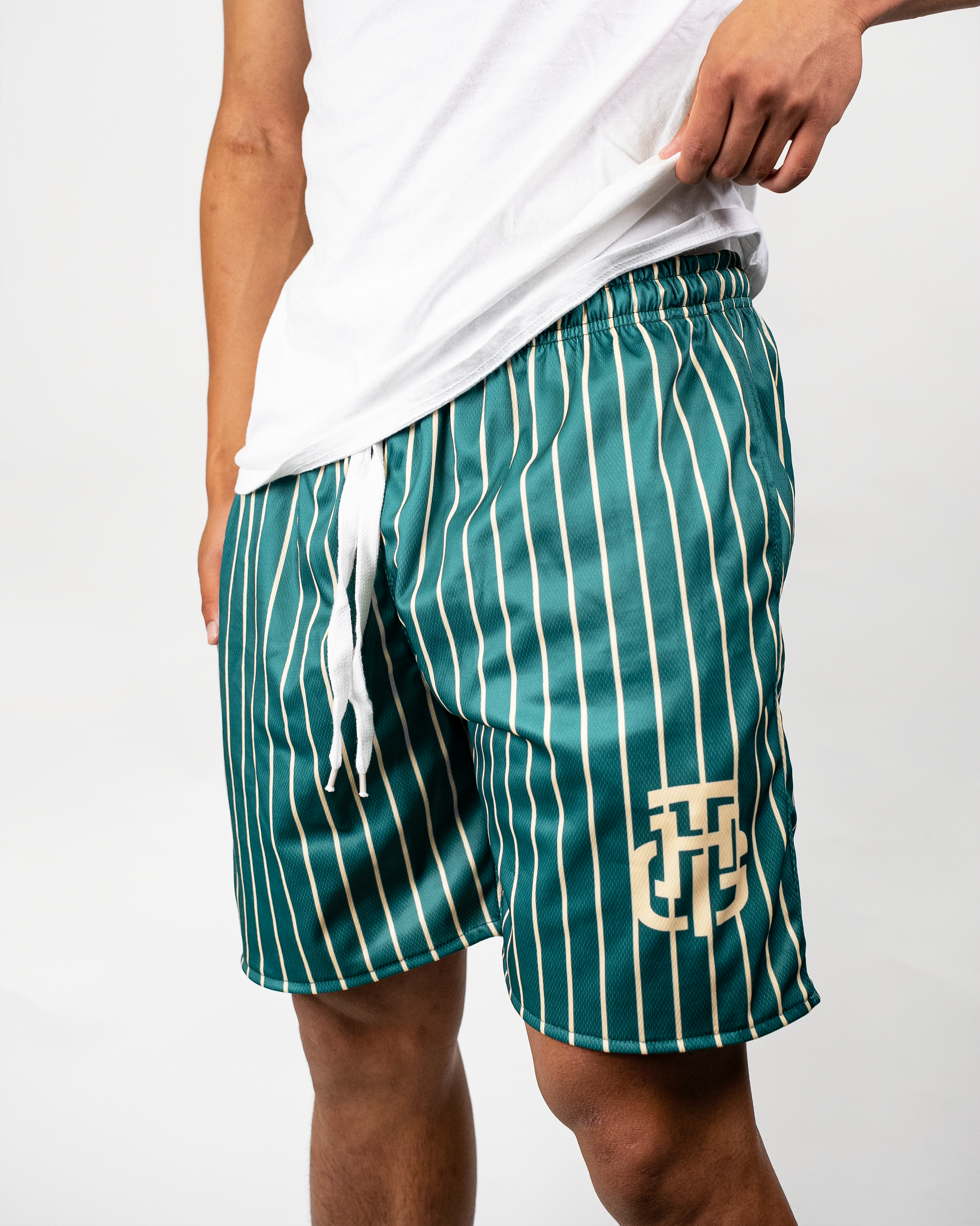 CREAM AND GREEN SHORTS