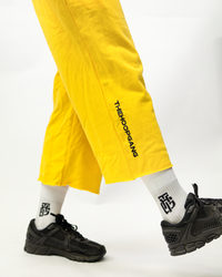 THG Yellow Cropped Sweatpants, cropped leg detail with side print